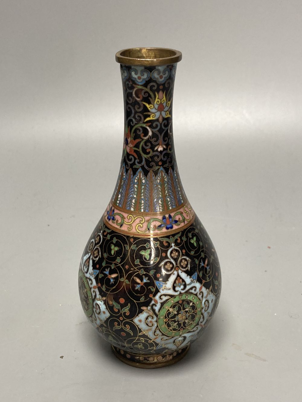 A Chinese powder blue ground vase and a similar cloisonne bottle vase, height 15cm